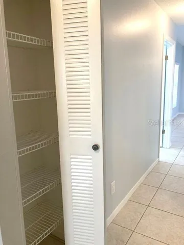 a view of a kitchen with a sink