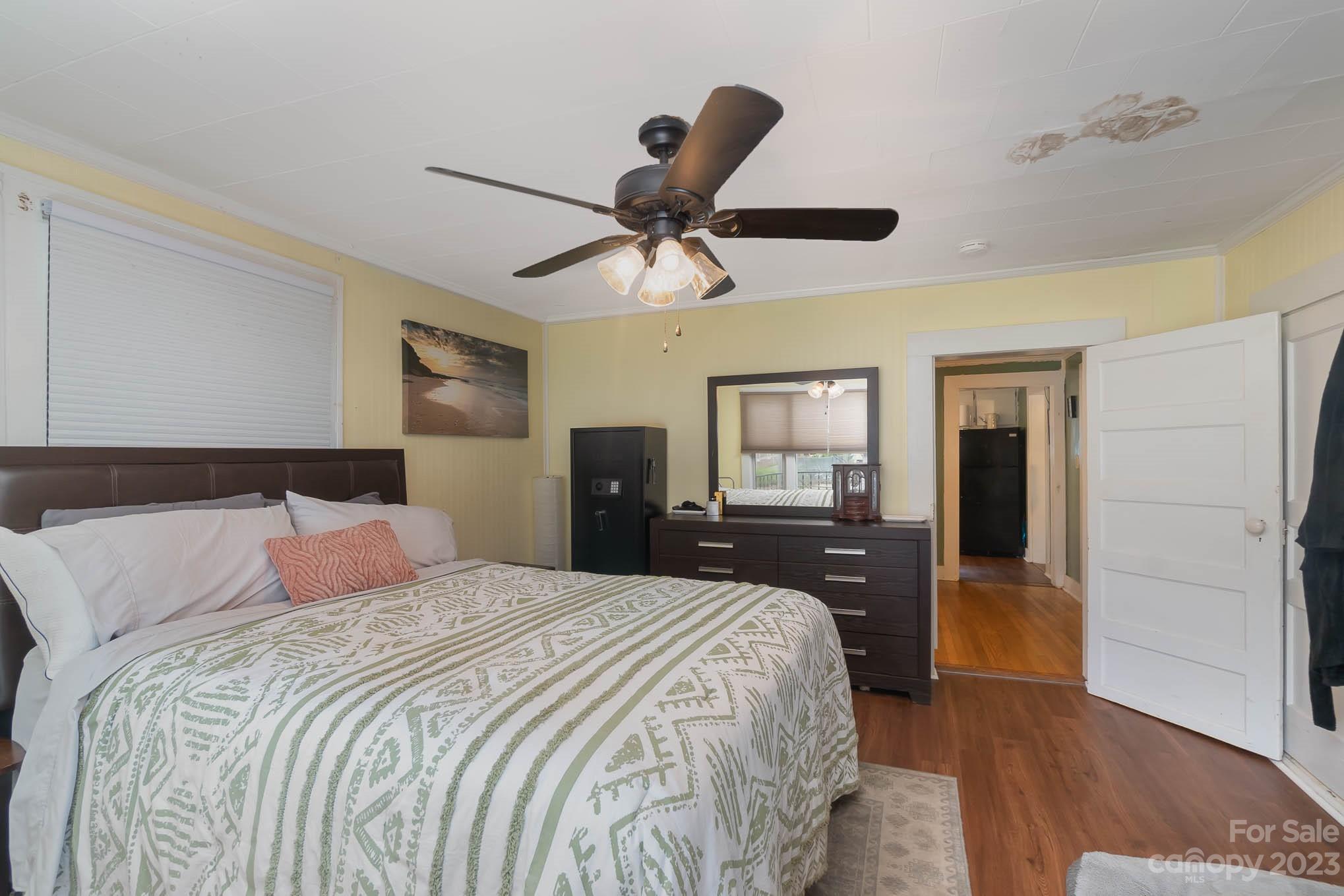 19 Union Street Maiden, NC 28650 - Photo 17 of 29 a bedroom with a large bed and ceiling fan