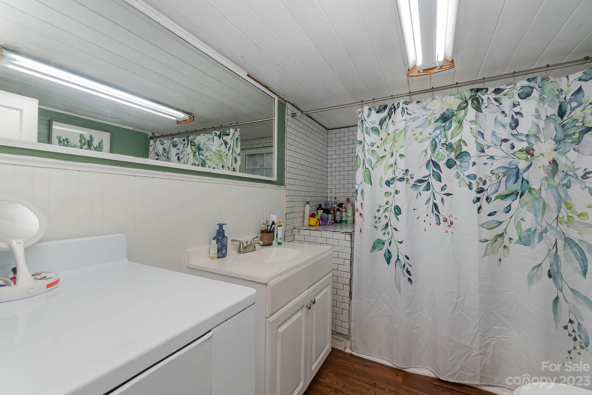 19 Union Street Maiden, NC 28650 - Photo 23 of 29 a bathroom with a sink and a mirror