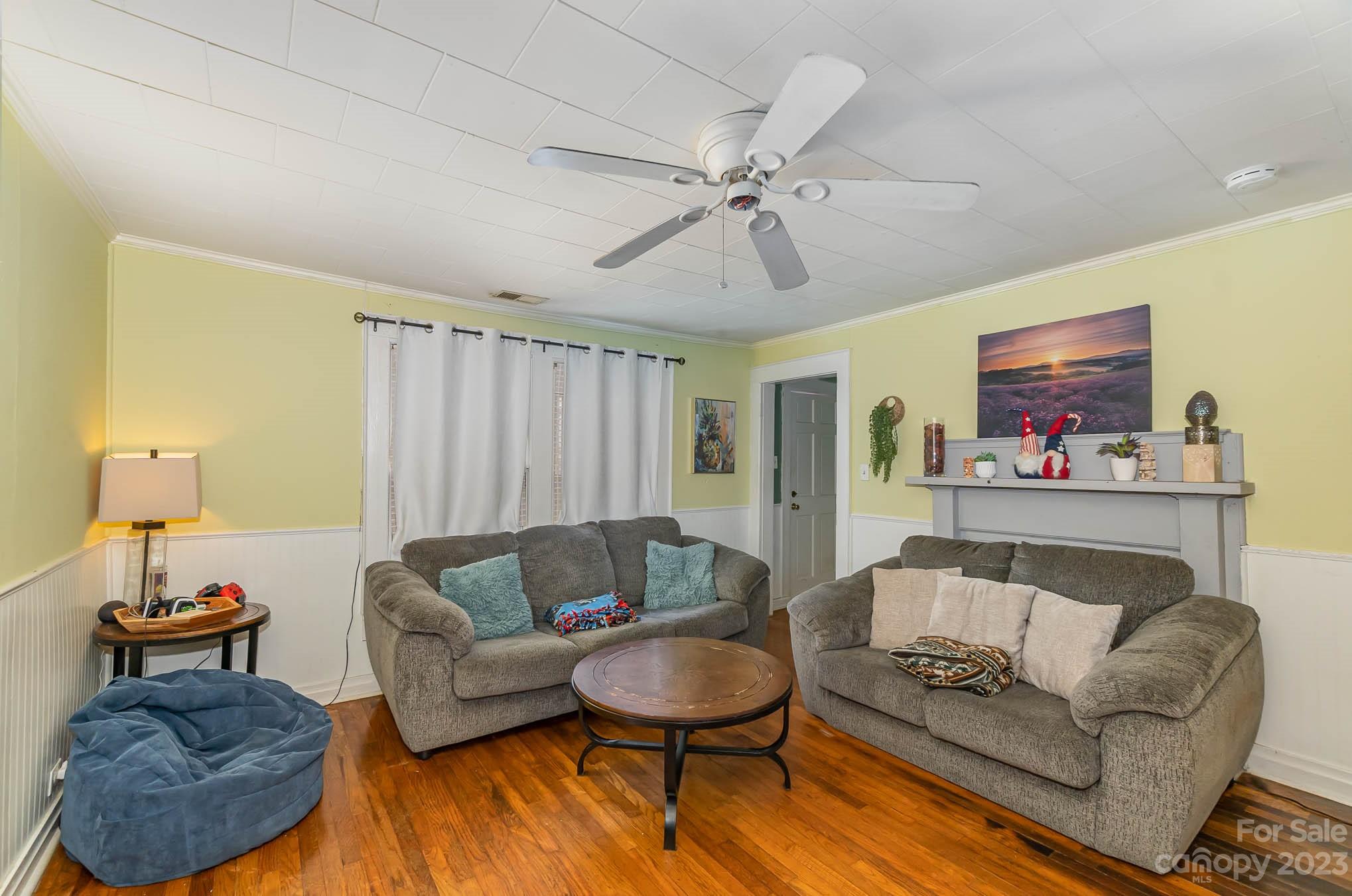 19 Union Street Maiden, NC 28650 - Photo 5 of 29 a living room with furniture and a wooden floor