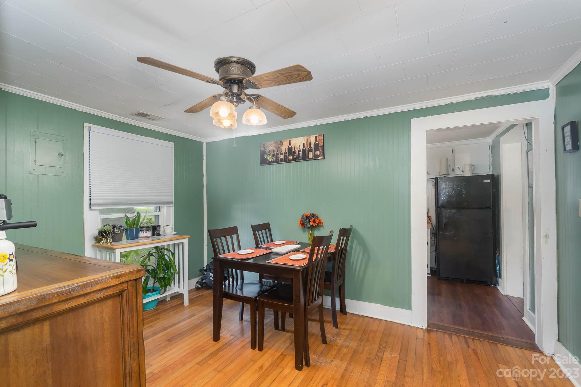 19 Union Street Maiden, NC 28650 - Photo 10 of 29 a view of a dining room with furniture and wooden floor