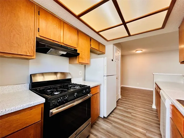 a kitchen with sink and window