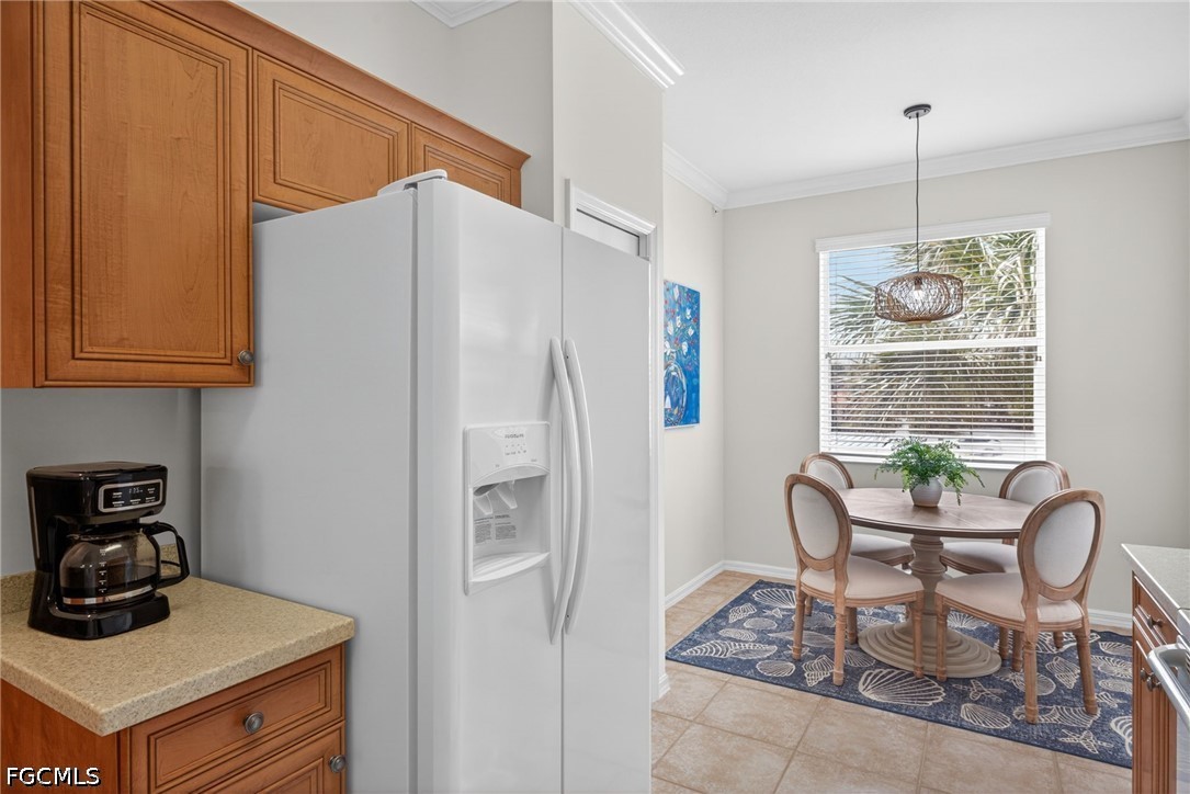 8251 Pathfinder Loop, Unit 621 Fort Myers, FL 33919 - Photo 6 of 30 a dining room with furniture and window