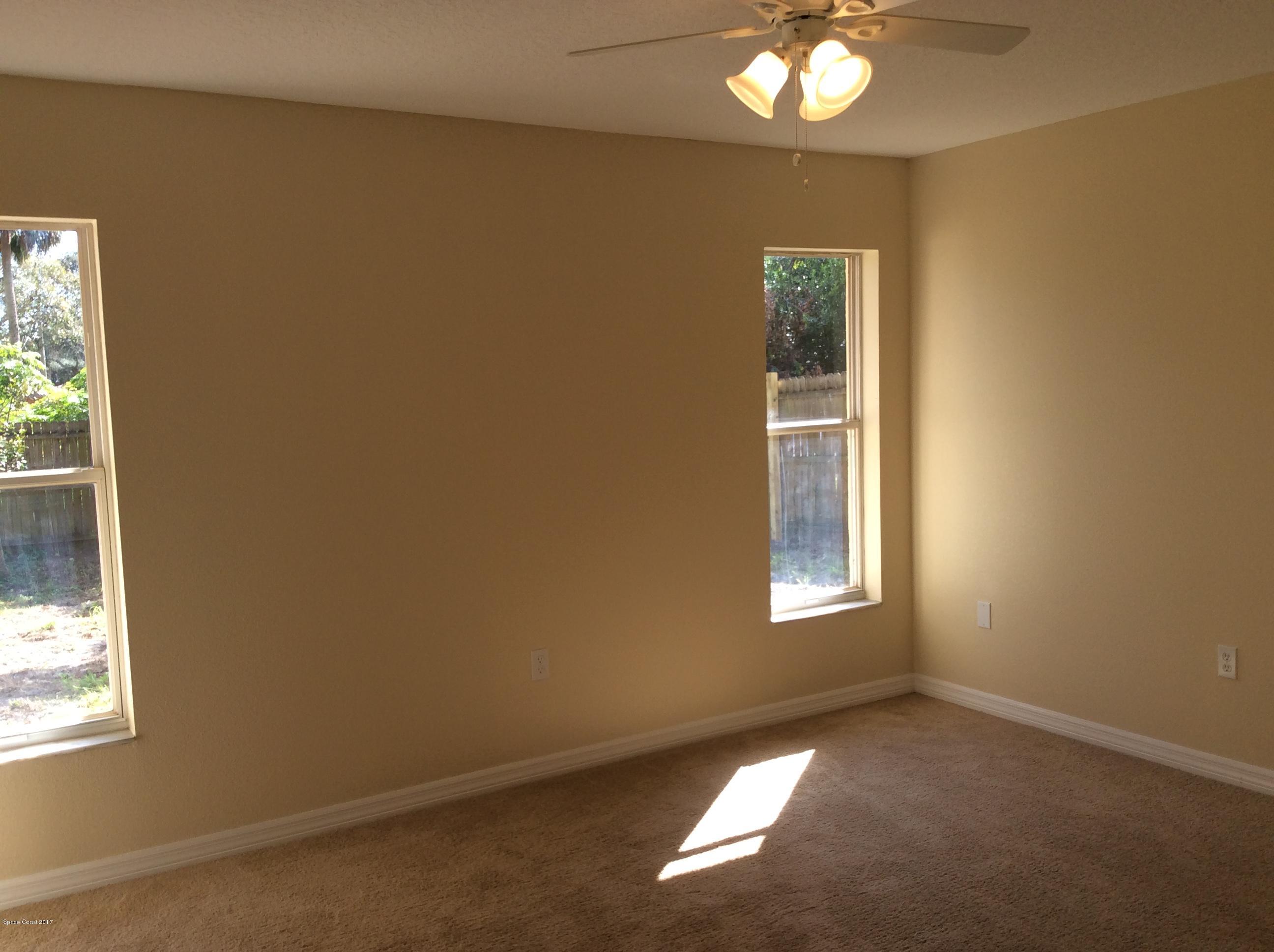 6361 Hudson Road Cocoa, FL 32927 - Photo 22 of 31 a view of an empty room with a window