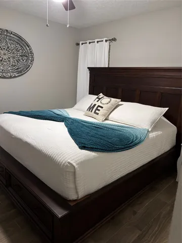 a sink sitting in a bedroom next to a cabinet