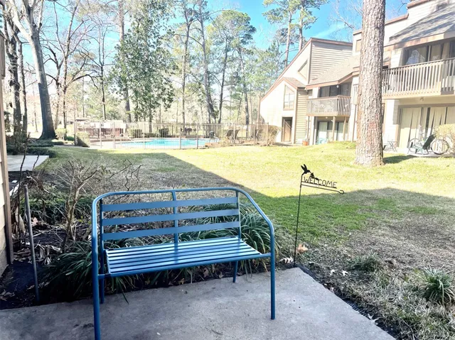 a view of outdoor space with garden and seating