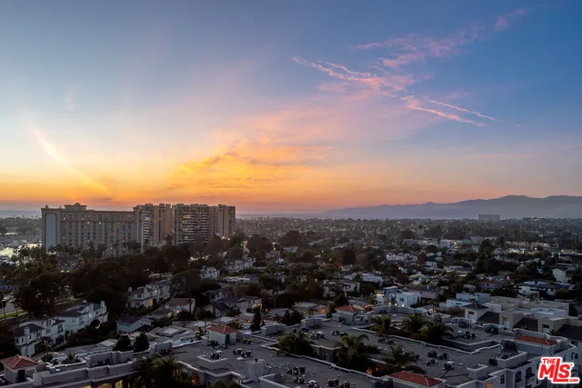 a view of a balcony with city view