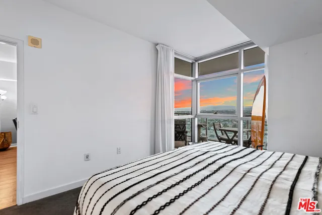 a bathroom with a tub and shower