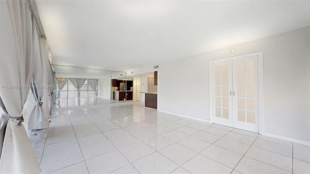 an empty room with windows