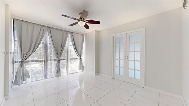 a view of an empty room and window