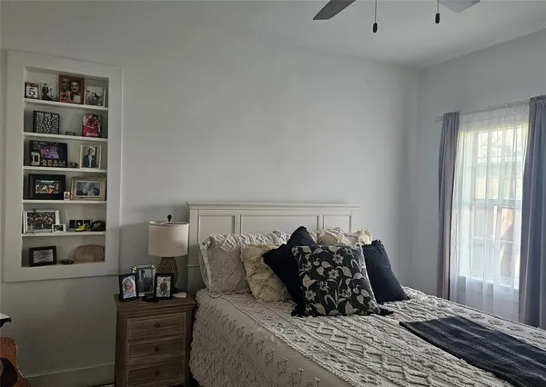 a bedroom with a bed and closet