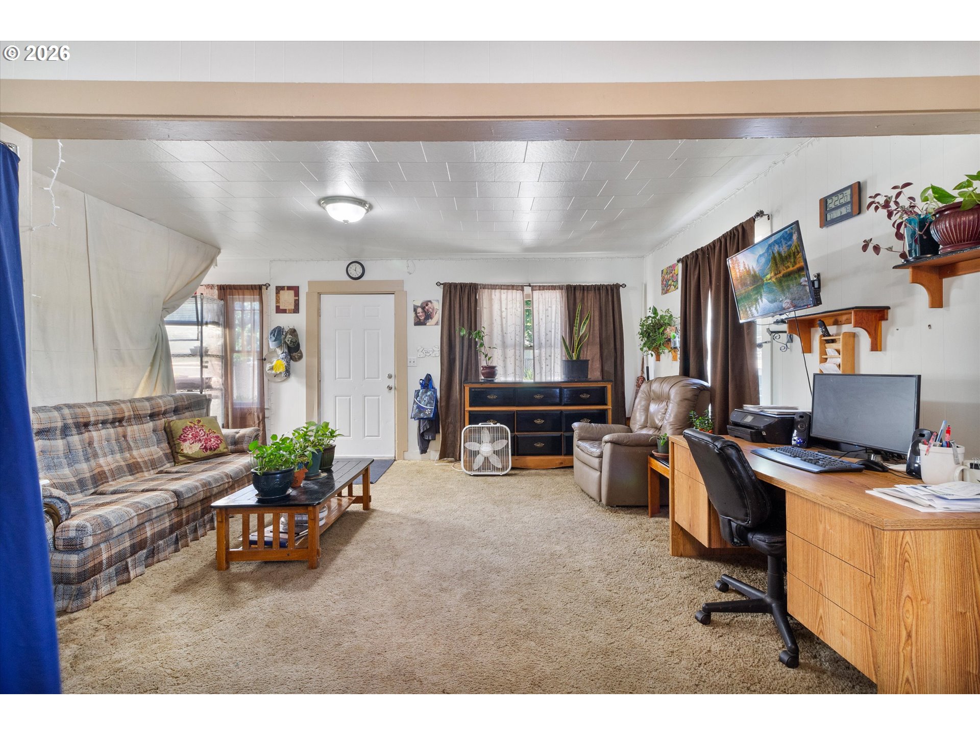 1225 West Main Street Medford, OR 97501 - Photo 11 of 45 a view of a livingroom with workspace and a window