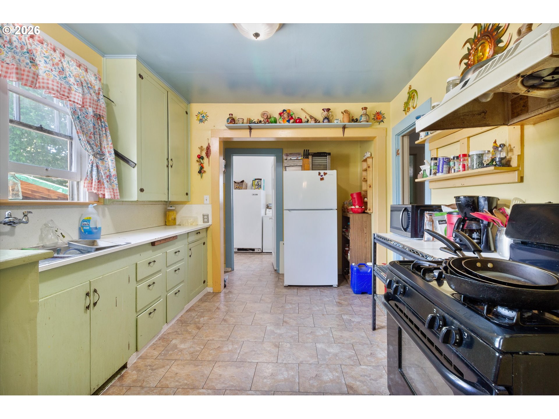 1225 West Main Street Medford, OR 97501 - Photo 17 of 45 a kitchen with a sink and a stove