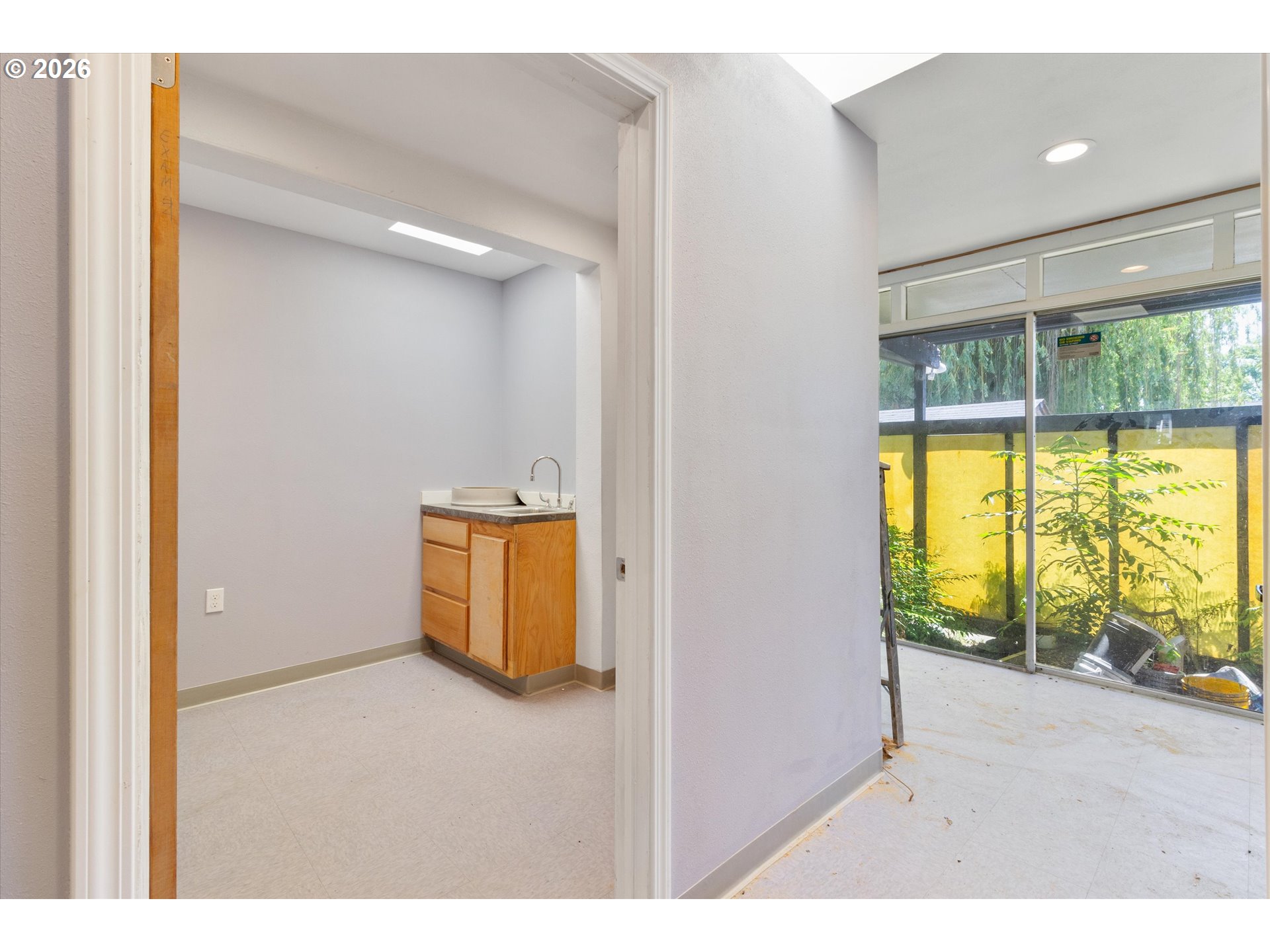 1225 West Main Street Medford, OR 97501 - Photo 35 of 45 a view of an empty room and a window