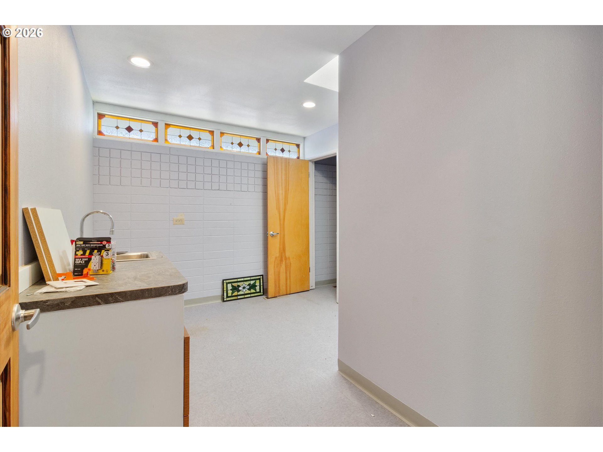 1225 West Main Street Medford, OR 97501 - Photo 36 of 45 a view of a hallway with workspace