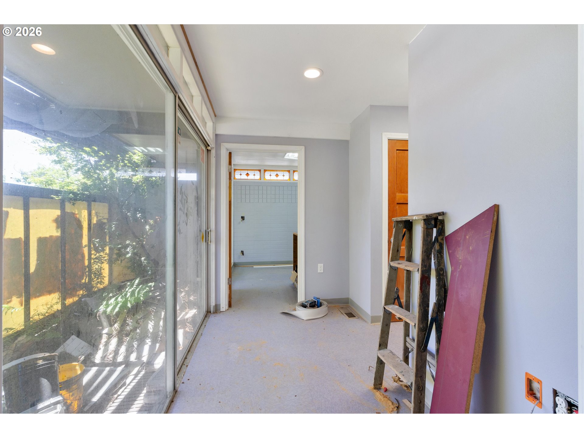 1225 West Main Street Medford, OR 97501 - Photo 38 of 45 a view of a hallway with a outdoor space