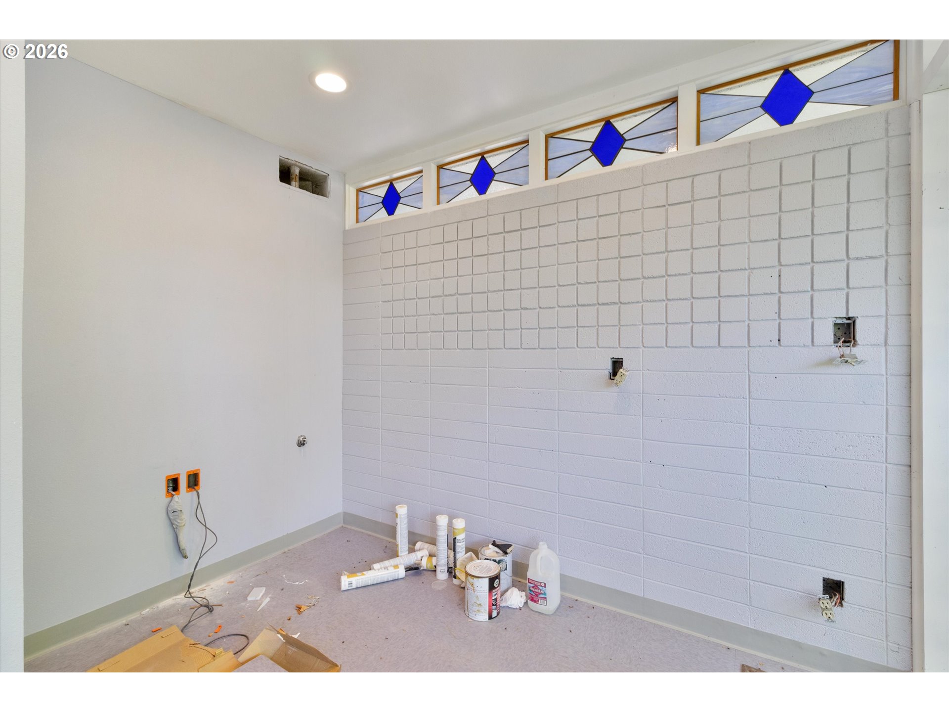 1225 West Main Street Medford, OR 97501 - Photo 39 of 45 a bathroom with a bathtub and shower