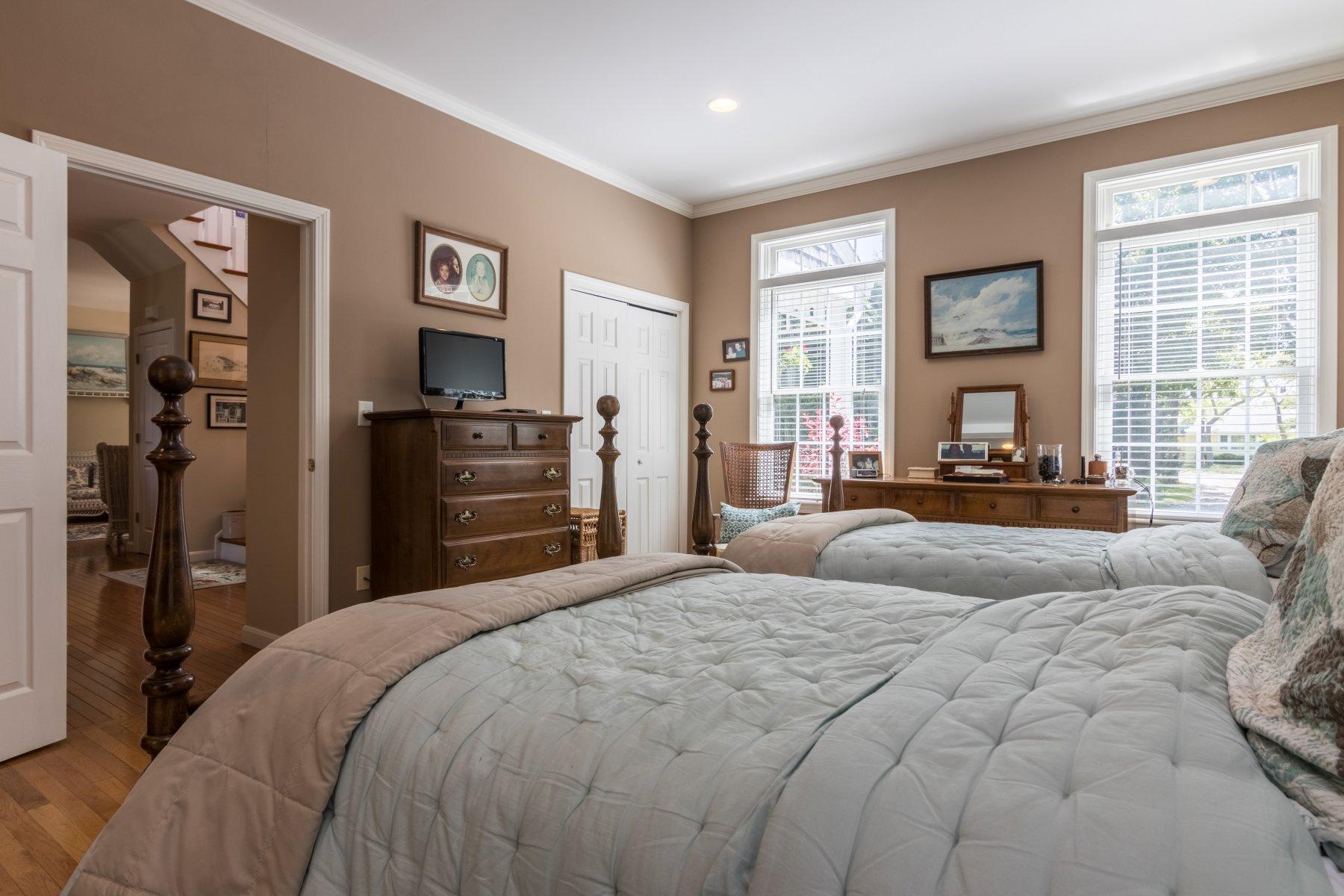 1925 Bridge Road Eastham, MA 02642 - Photo 24 of 35 a bedroom with a bed and a couch