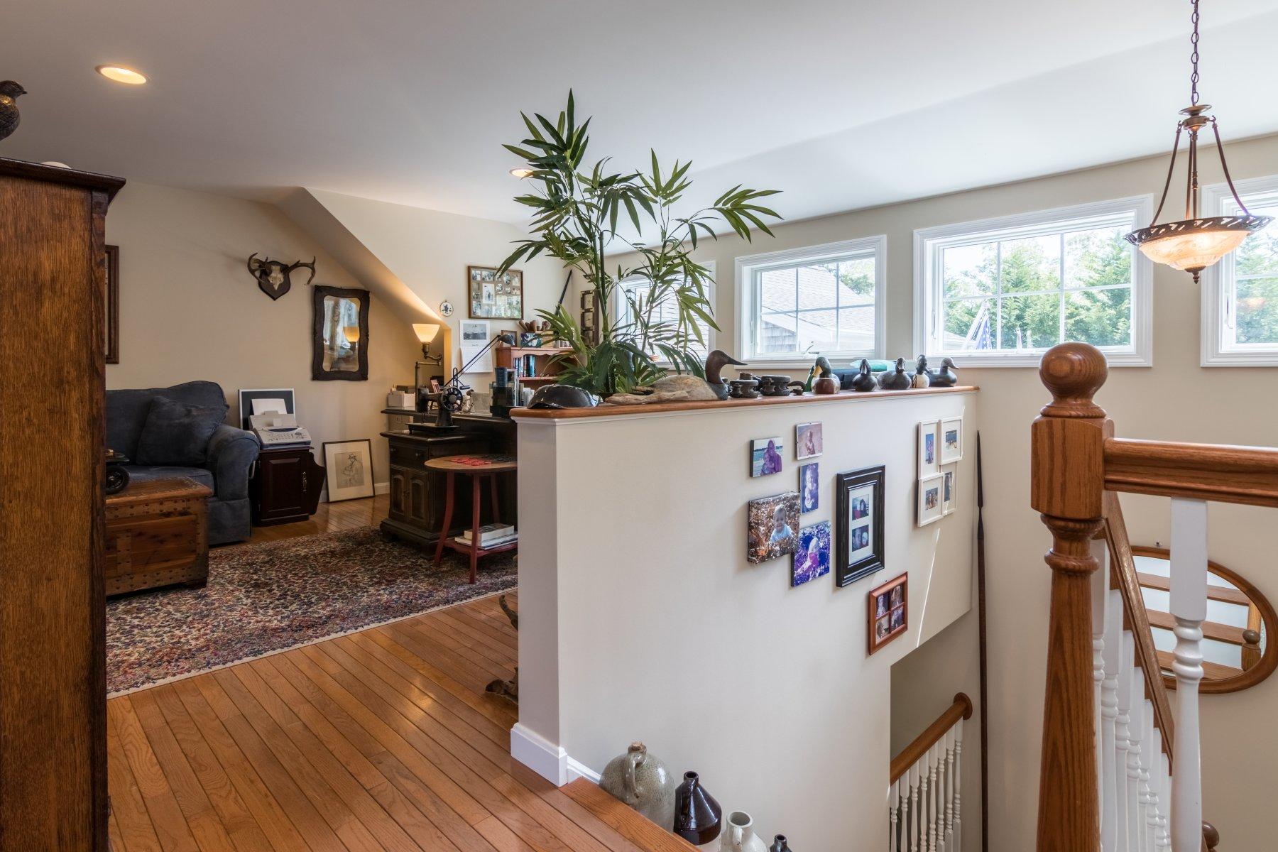 1925 Bridge Road Eastham, MA 02642 - Photo 33 of 35 a living room with furniture and a table