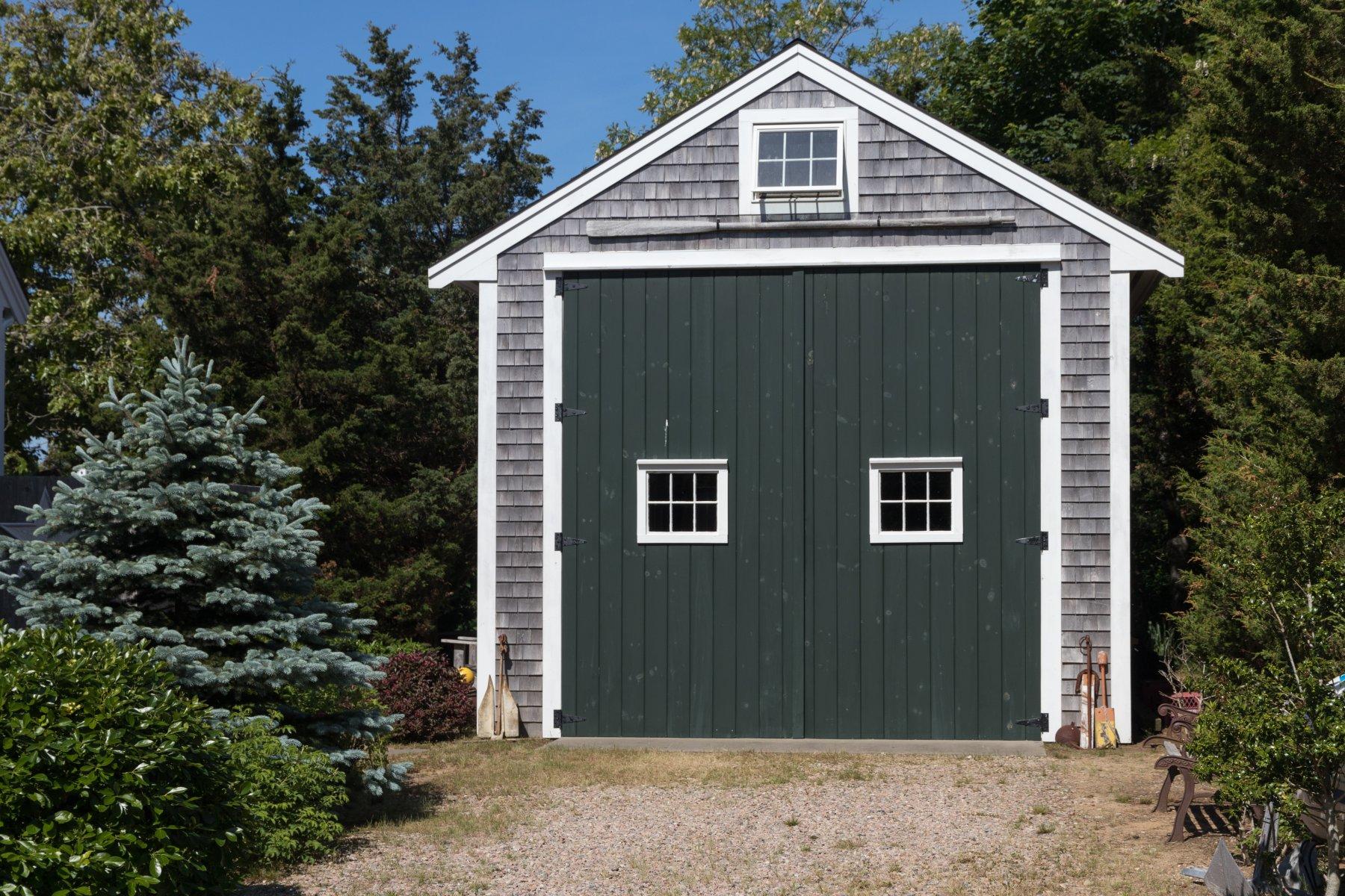 1925 Bridge Road Eastham, MA 02642 - Photo 8 of 35 a front view of a house with a yard