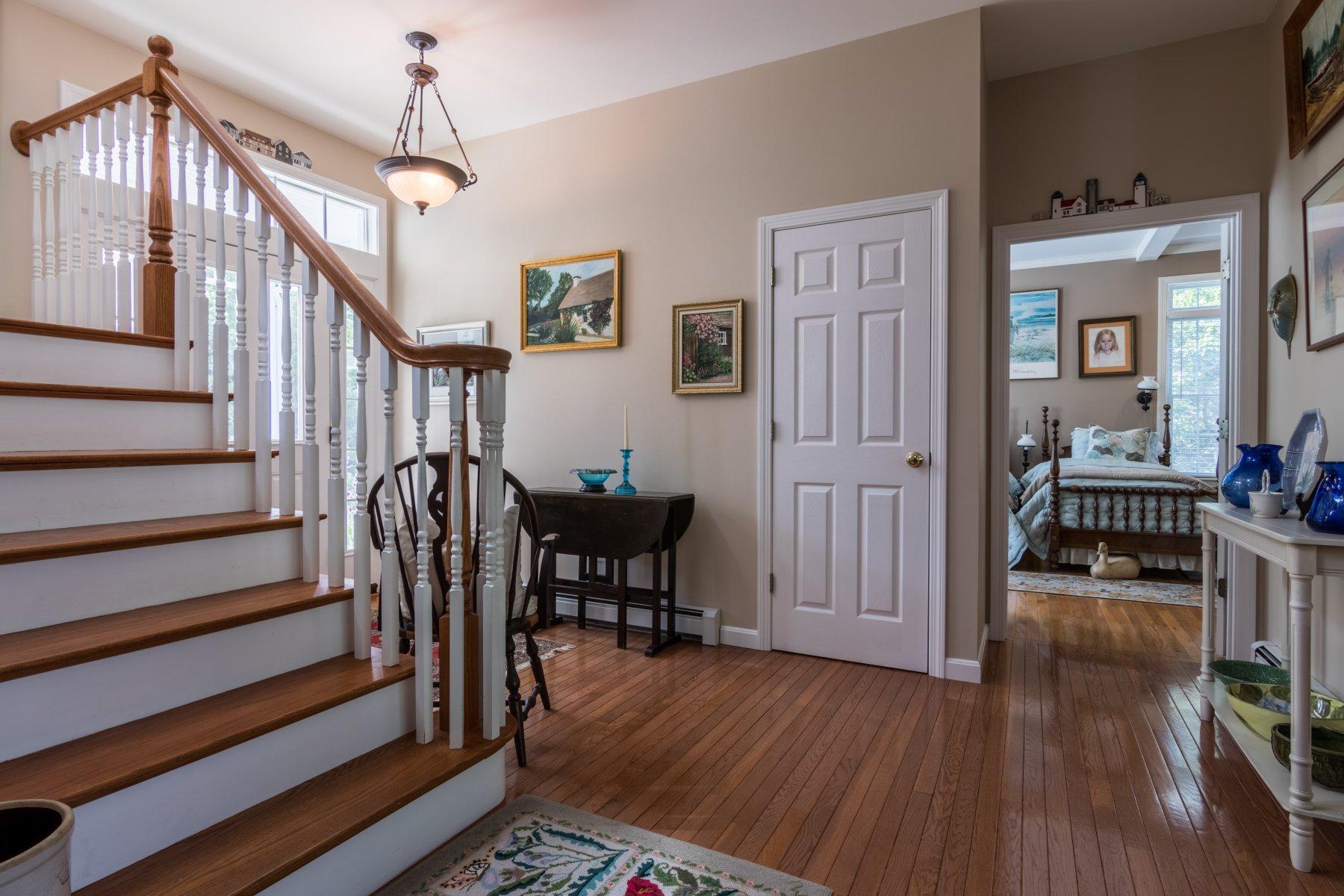 1925 Bridge Road Eastham, MA 02642 - Photo 10 of 35 a view of a livingroom with furniture and hardwood floor