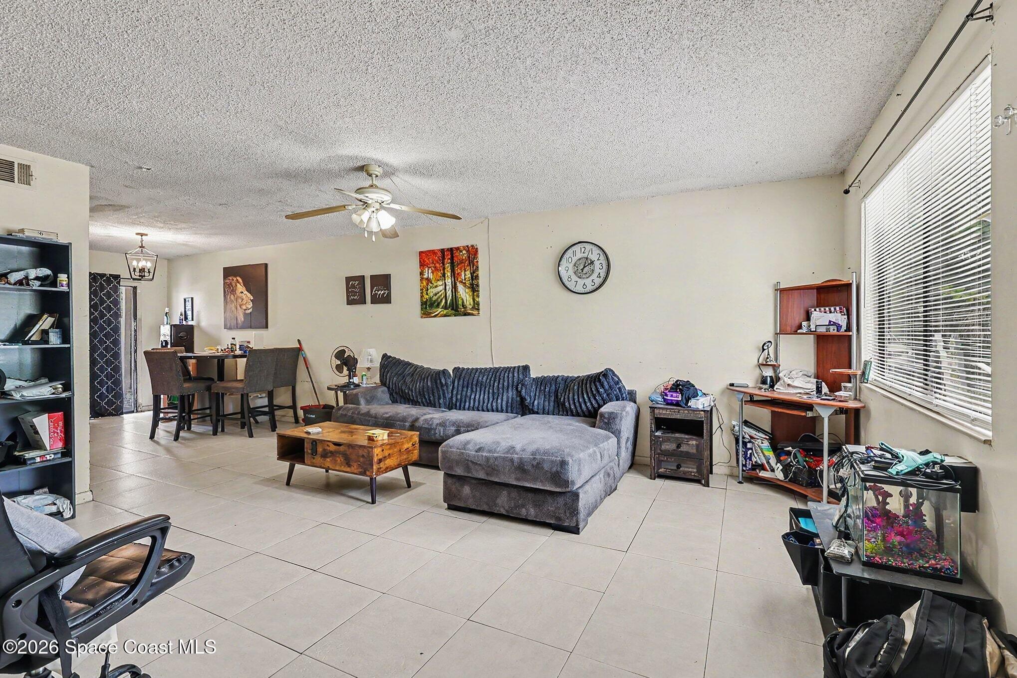 4017 Tree Ridge Lane Northeast Palm Bay, FL 32905 - Photo 7 of 25 009_file_6640