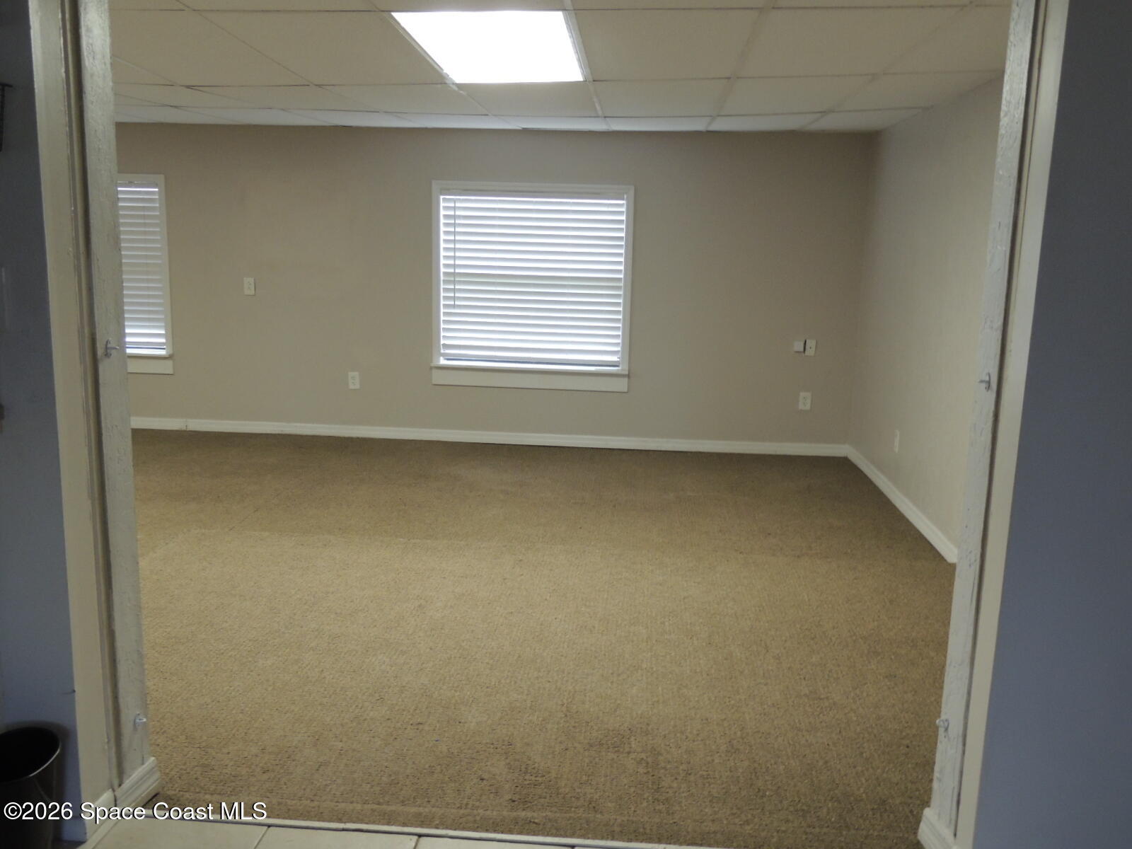 1312 Huntington Lane Rockledge, FL 32955 - Photo 7 of 21 a view of a room that has a window