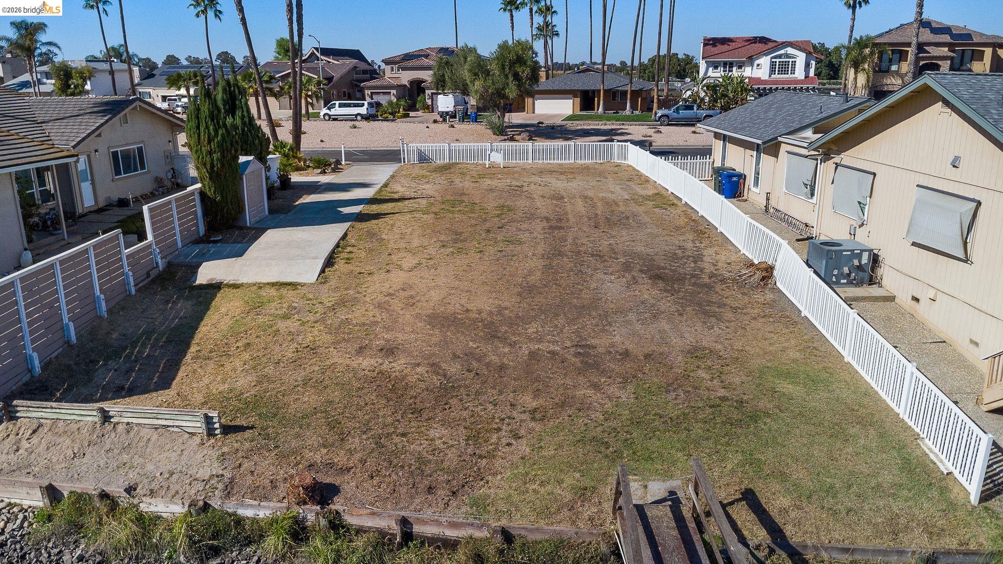 4475 Discovery Point Discovery Bay, CA 94505 - Photo 13 of 16 a view of a backyard with sitting area
