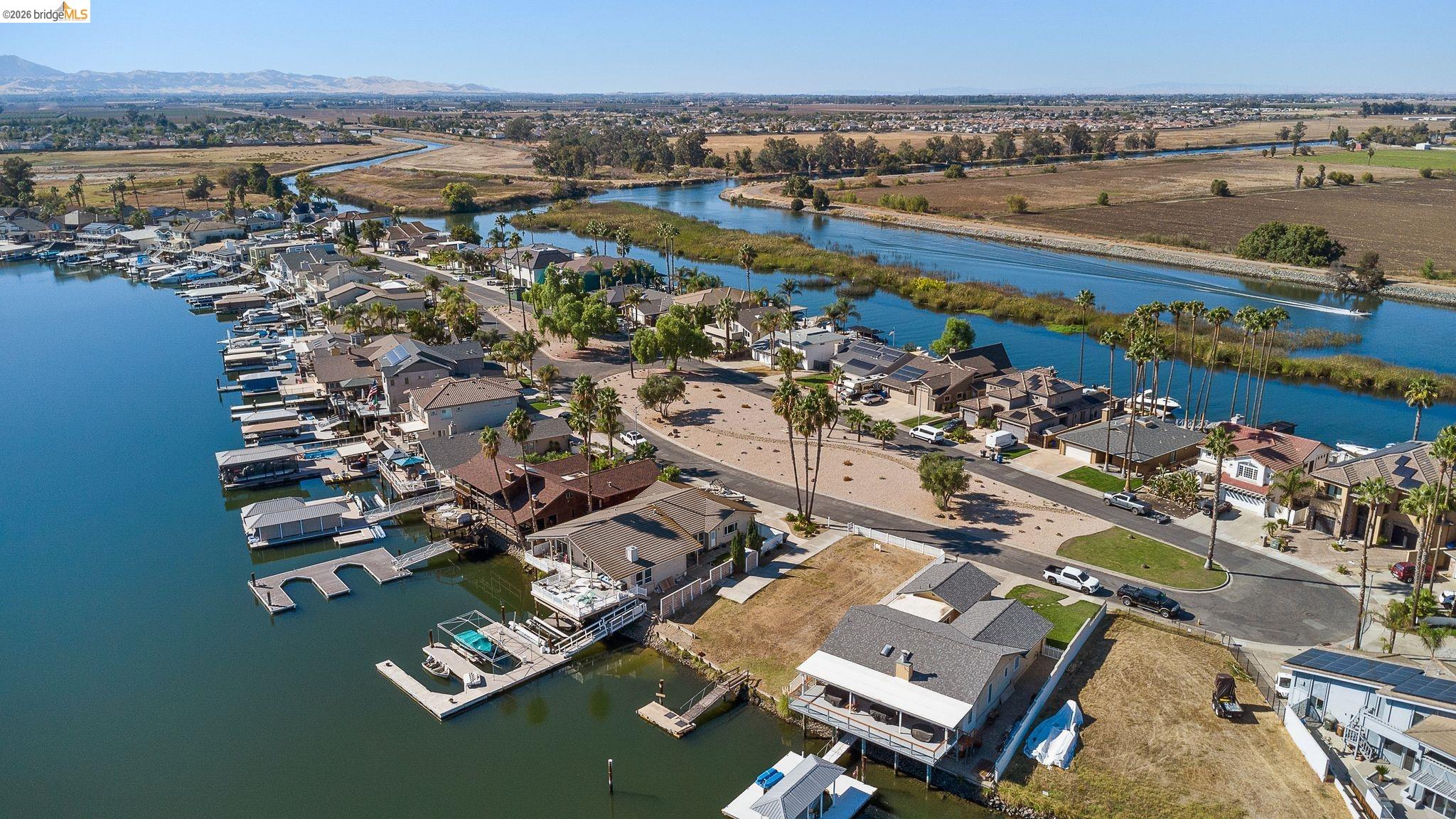 4475 Discovery Point Discovery Bay, CA 94505 - Photo 2 of 16 an aerial view of a city with ocean view