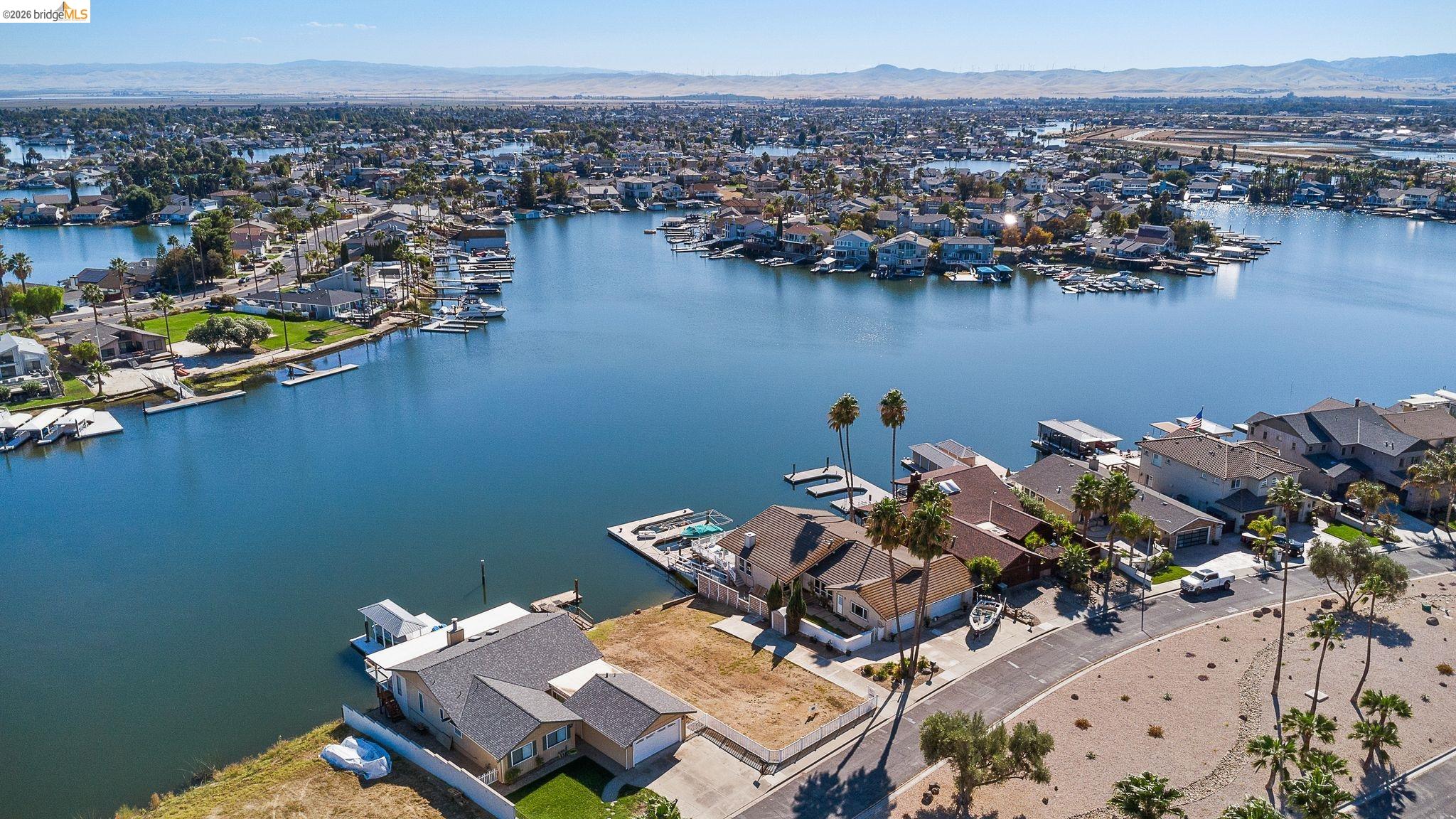4475 Discovery Point Discovery Bay, CA 94505 - Photo 6 of 16 an aerial view of a house with a lake view
