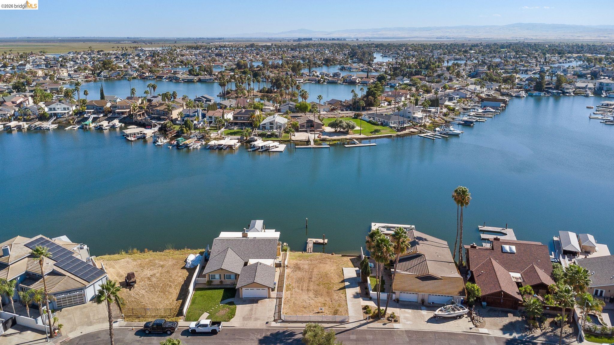4475 Discovery Point Discovery Bay, CA 94505 - Photo 7 of 16 an aerial view of a house with a ocean view