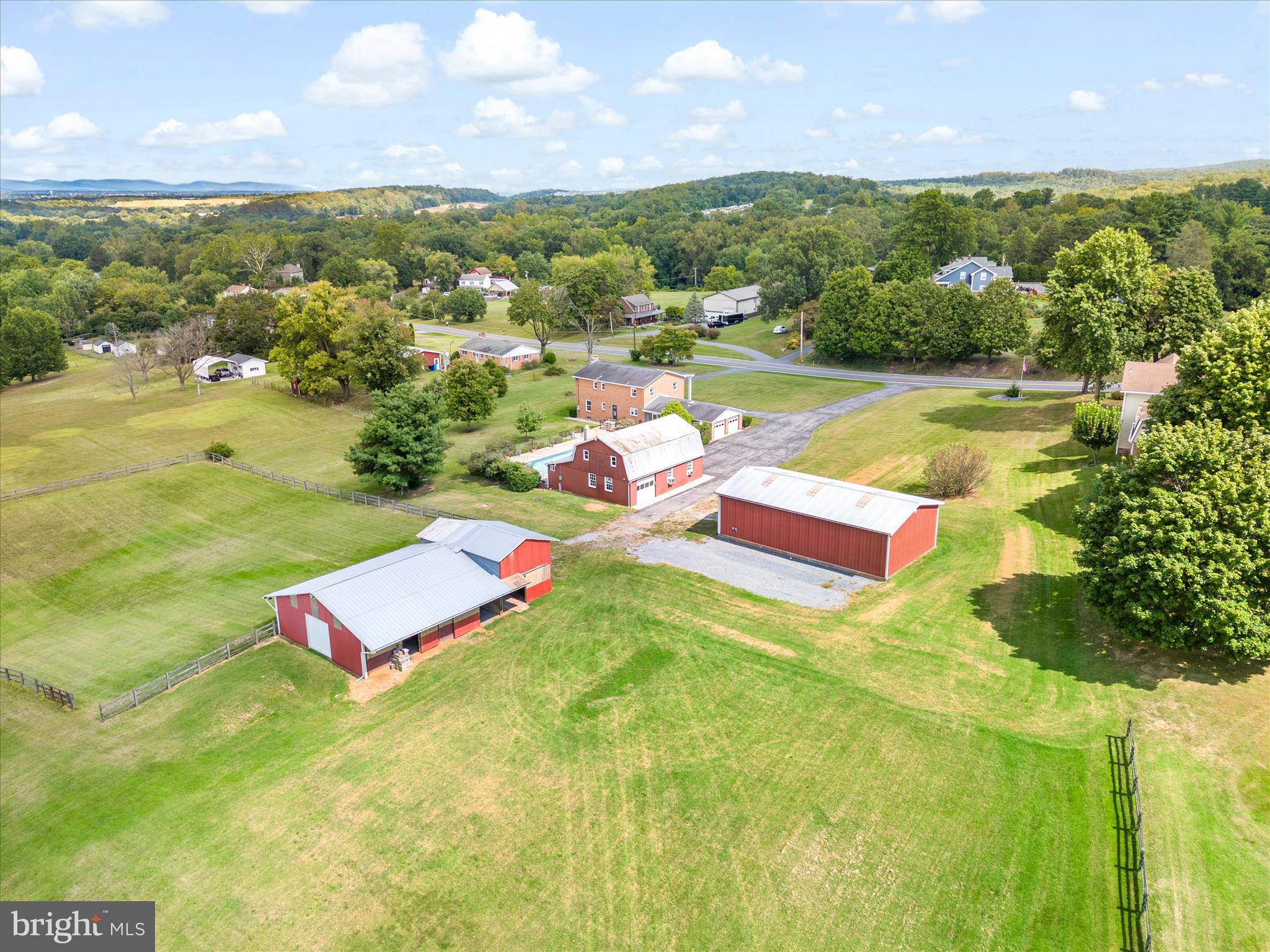 4514 Araby Church Road Frederick, MD 21704 - Photo 3 of 89 a view of a big yard with an outdoor space and seating area