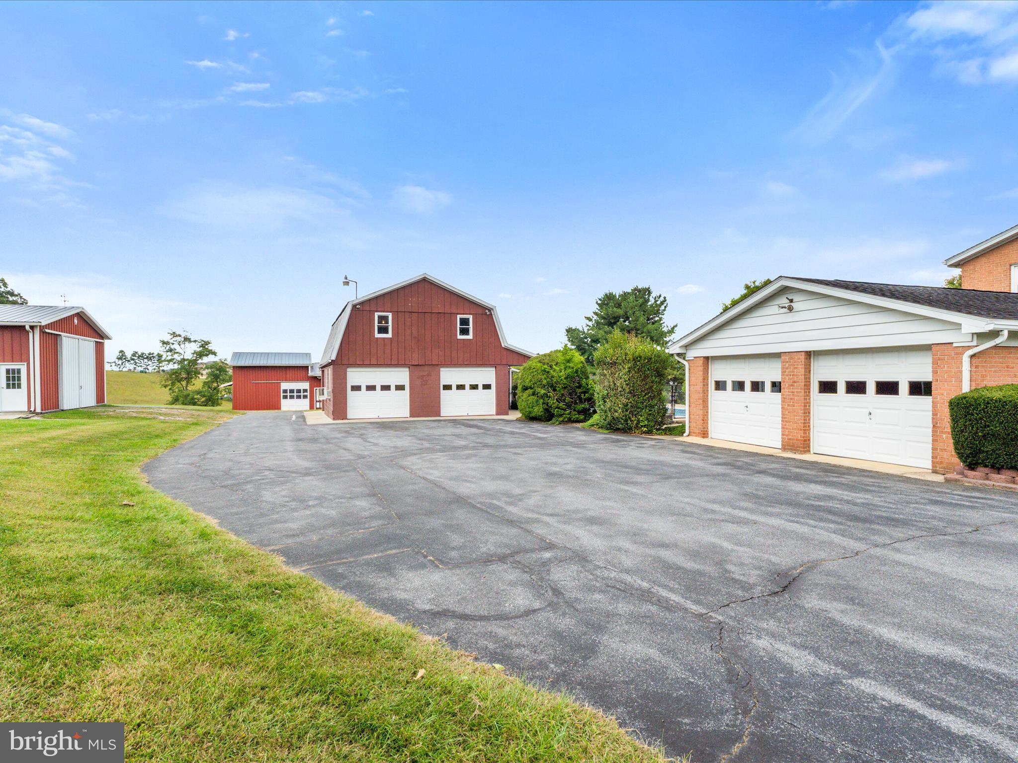 4514 Araby Church Road Frederick, MD 21704 - Photo 55 of 89 a view of a big house with a big yard and large trees