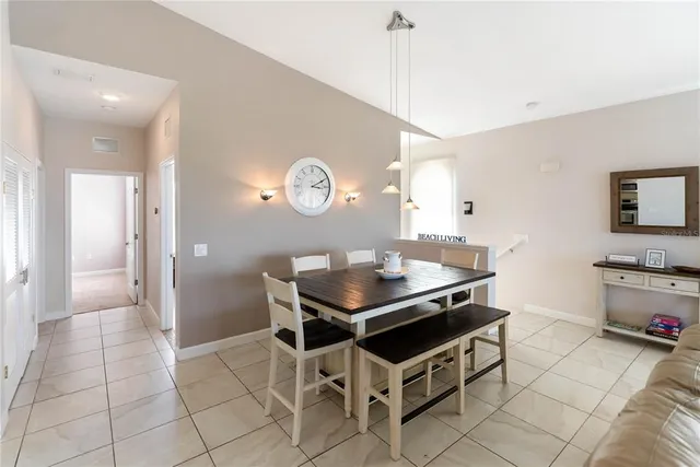a living room with furniture a wooden floor and a window