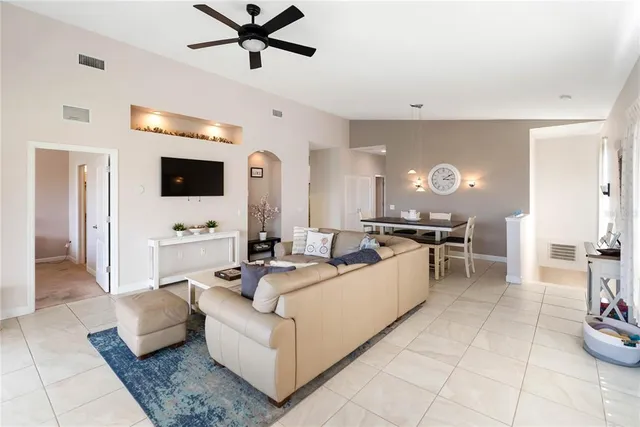 an aerial view of a house with a lake view