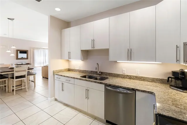 a group of people sitting in a living room