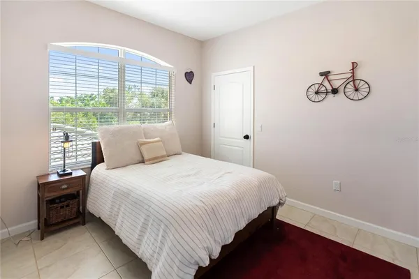 a view of a balcony with furniture