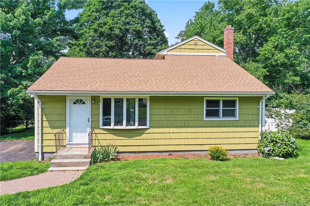 73 Brooklawn Drive Meriden, CT 06450 - Photo 1 of 1 a front view of a house with a yard