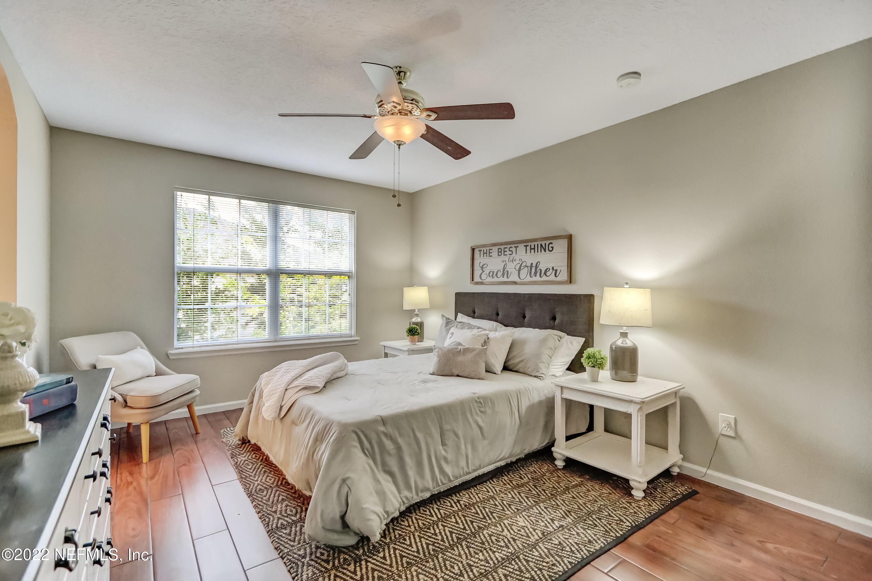 6849 Misty View Drive Jacksonville, FL 32210 - Photo 13 of 21 a bedroom with a bed and a window