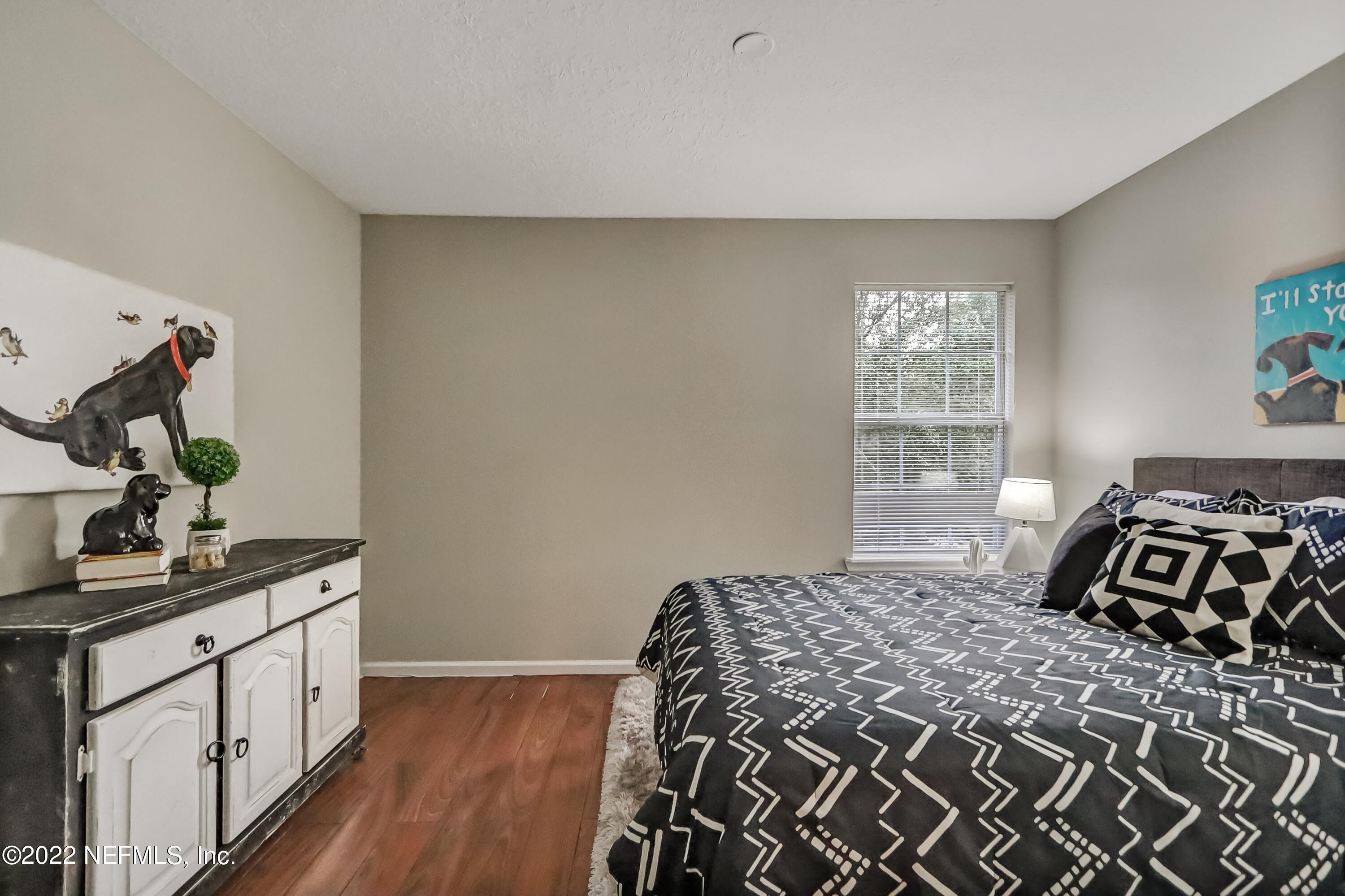 6849 Misty View Drive Jacksonville, FL 32210 - Photo 21 of 21 a bedroom with a bed and a window