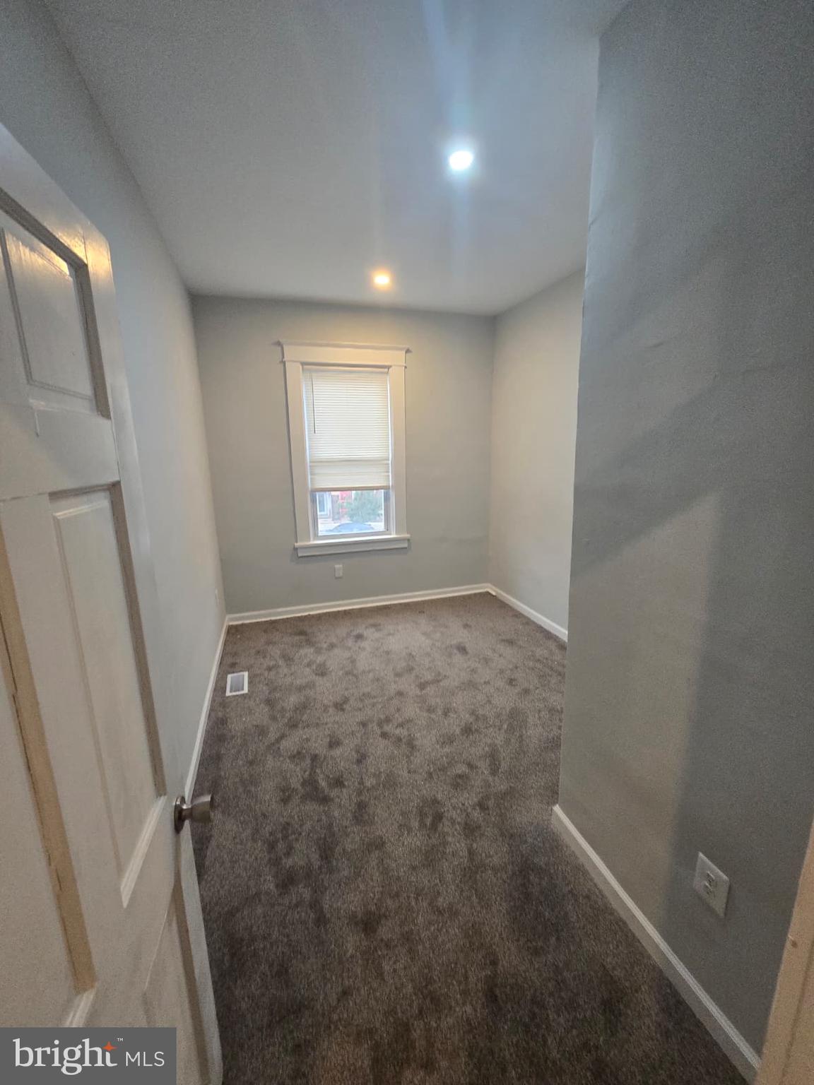 2430 Reisterstown Road Baltimore, MD 21217 - Photo 29 of 40 an empty room with windows