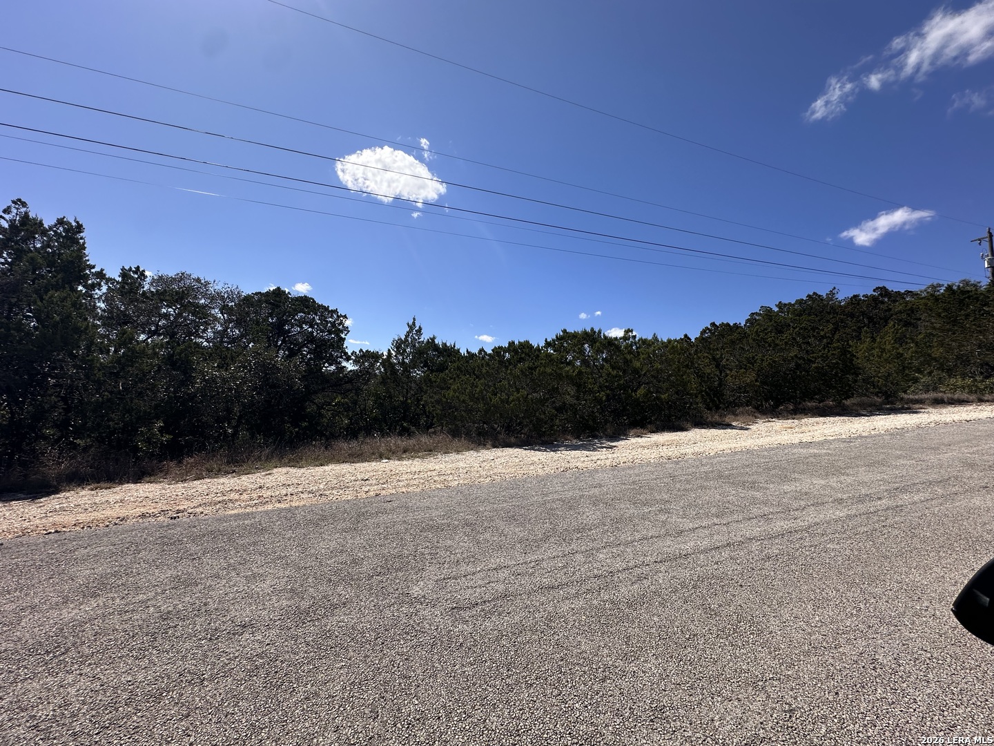 15669 Vista Grande Helotes, TX 78023 - Photo 11 of 12 a view of ocean and mountain