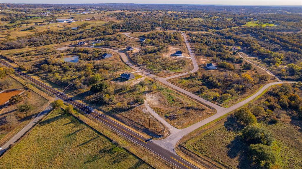 237 Jefferson Way Weatherford, TX 76088 - Photo 4 of 5 an aerial view of a residential houses with city view