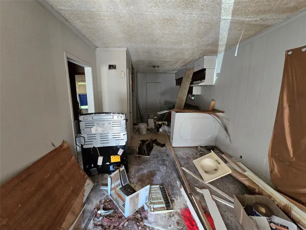 a room with furniture and wooden floor