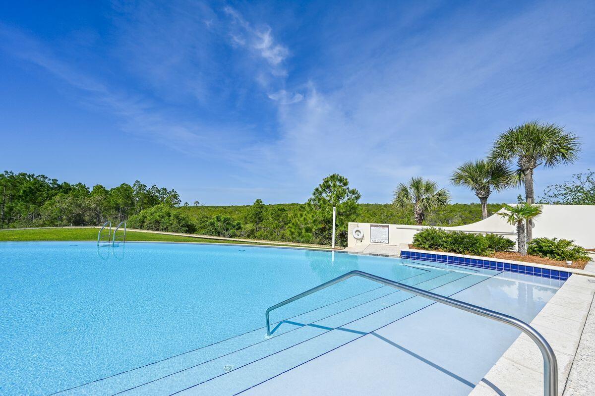 Lot 87 Cypress Drive Santa Rosa Beach, FL 32459 - Photo 13 of 39 a view of a swimming pool and an outdoor seating