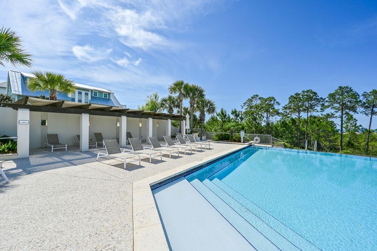 Lot 87 Cypress Drive Santa Rosa Beach, FL 32459 - Photo 14 of 39 a view of a house with pool and sitting area