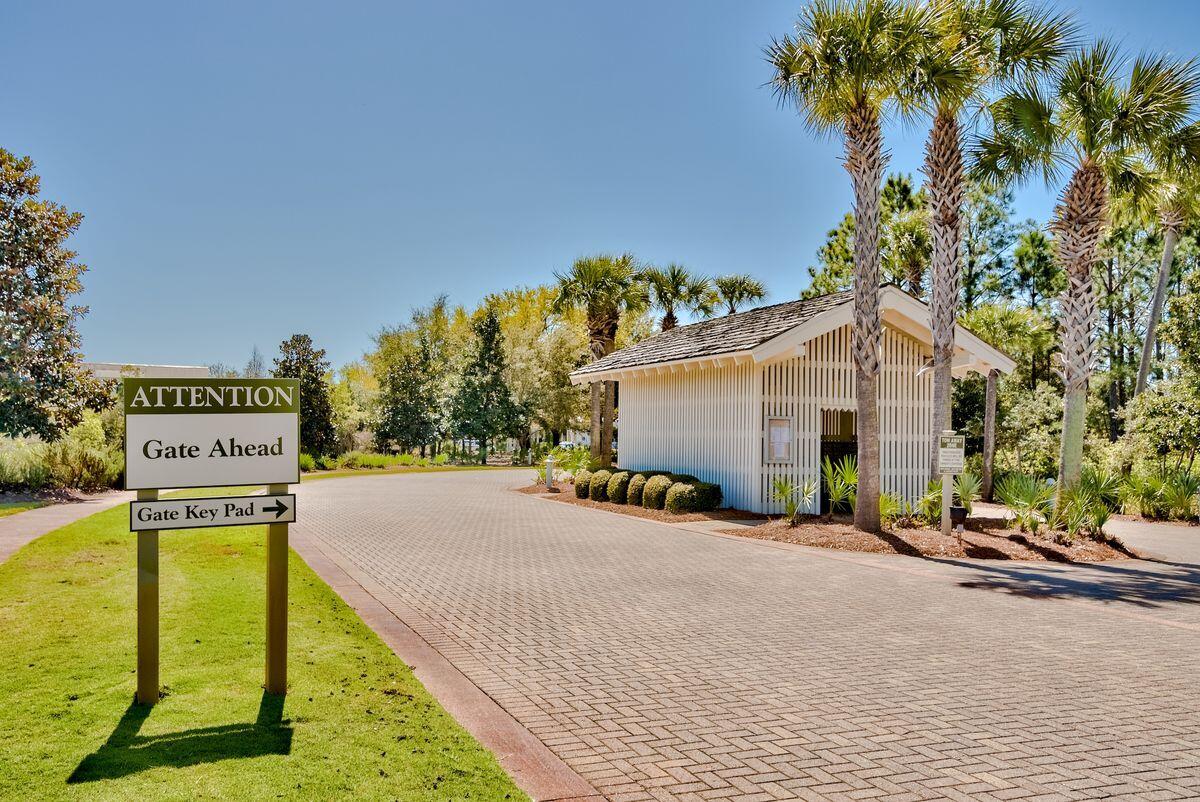 Lot 87 Cypress Drive Santa Rosa Beach, FL 32459 - Photo 30 of 39 a view of a street with palm trees