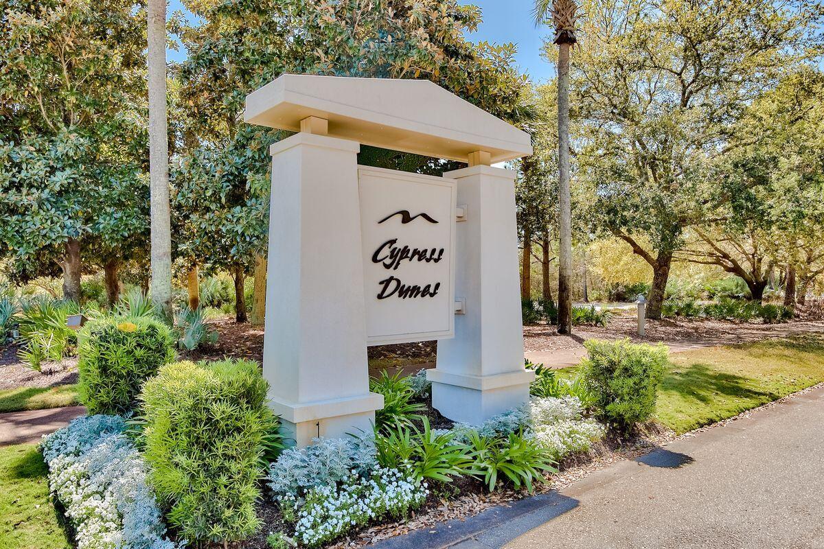 Lot 87 Cypress Drive Santa Rosa Beach, FL 32459 - Photo 4 of 39 a front view of a house with garden