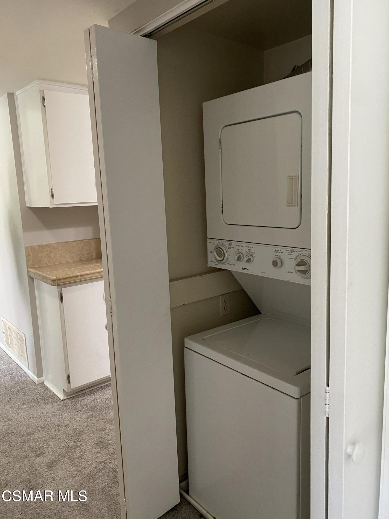 1778 Sinaloa Road, Unit 298 Simi Valley, CA 93065 - Photo 19 of 43 a utility room with dryer and washer