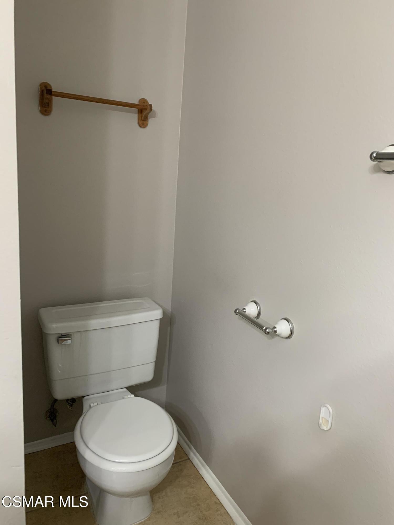 1778 Sinaloa Road, Unit 298 Simi Valley, CA 93065 - Photo 25 of 43 a white toilet sitting next to a shower